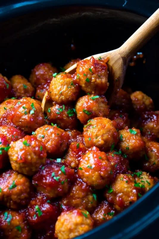 <p>A Southern Soul</p><p>Tender, succulent meatballs with irresistible flavor; and of course a little bourbon.</p><p><strong>Get the recipe: <a href="https://www.asouthernsoul.com/crock-pot-bourbon-meatballs-recipe/" rel="nofollow noopener" target="_blank" data-ylk="slk:Crock Pot Bourbon Meatballs;elm:context_link;itc:0;sec:content-canvas" class="link rapid-noclick-resp">Crock Pot Bourbon Meatballs</a></strong></p>