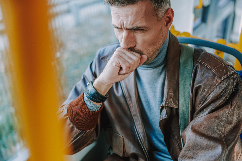 Gentleman using public transport to get home stock photo