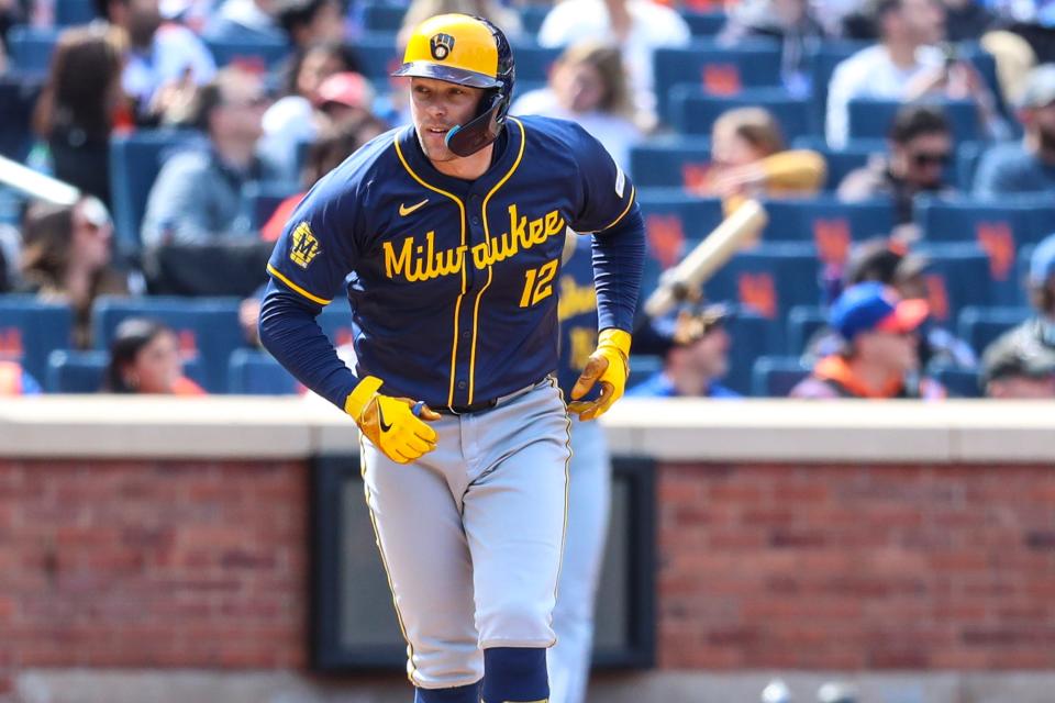 Brewers designated hitter Rhys Hoskins stares into the Mets dugout after hitting a two-run home run in the third inning Saturday.