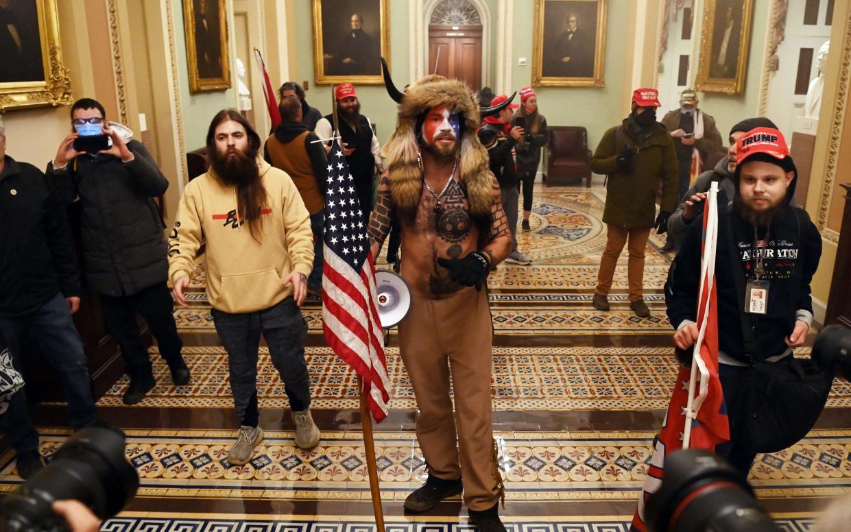 Trump supporters stormed the US Capitol after mass demonstrations in Washington following Biden's presidential win - AFP