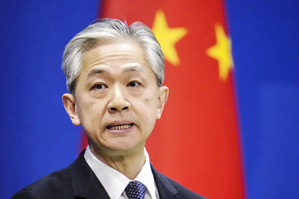 Chinese Foreign Ministry spokesman Wang Wenbin speaks at a press conference in Beijing on Feb. 15, 2023. (Kyodo via AP)