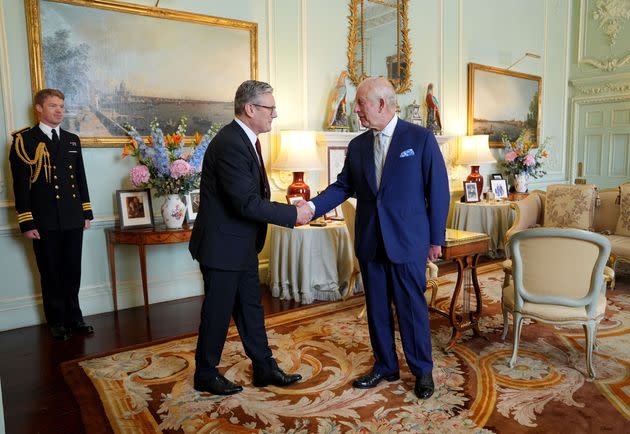 King Charles III welcomes Sir Keir Starmer during an audience at Buckingham Palace, London, where he invited the leader of the Labour Party to become Prime Minister and form a new government on July 5, 2024.