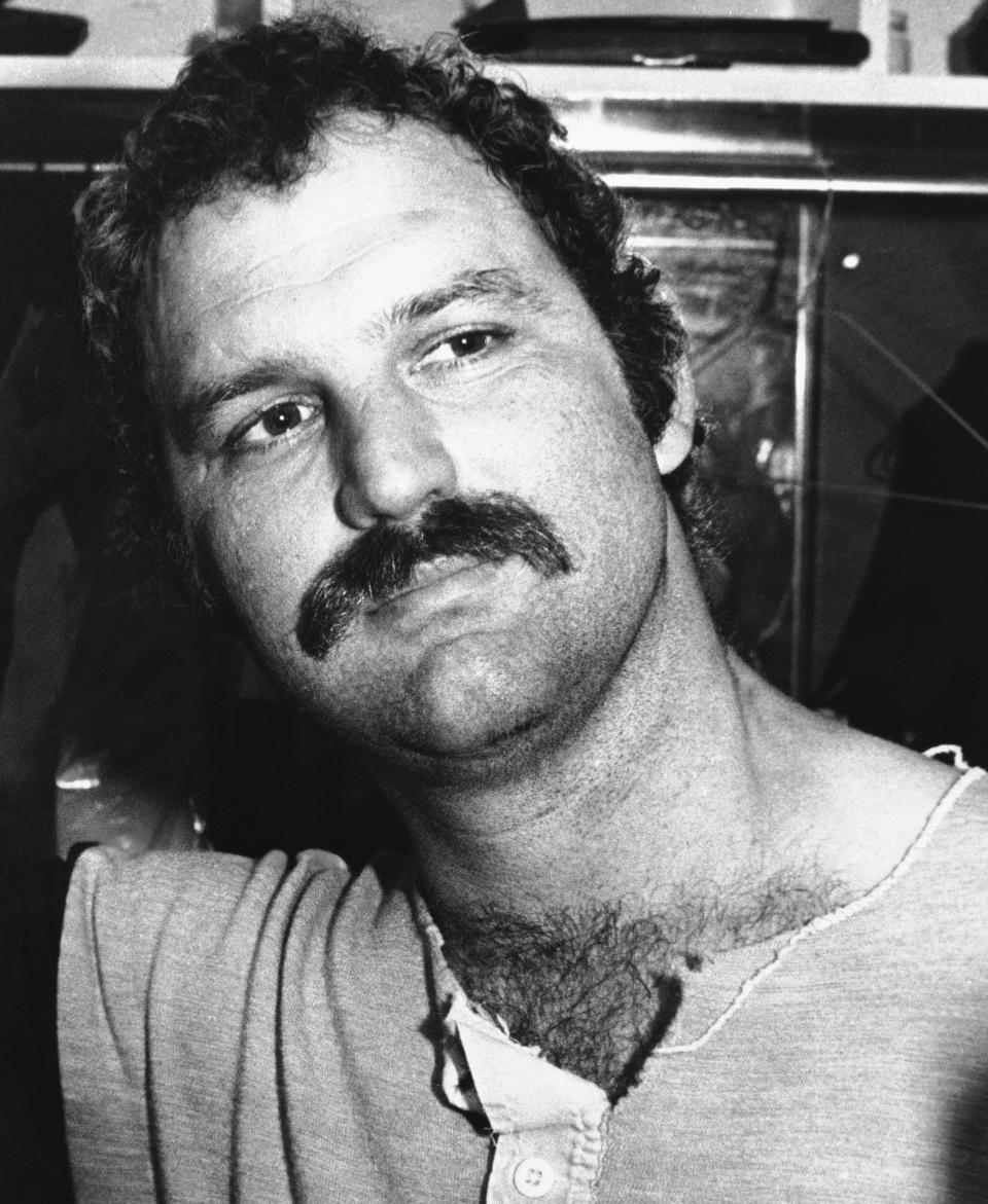 Thurman Munson talks with reporters in the dressing room at Yankee Stadium after a 6-5 win over the Royals in Game 3 of the ALCS, Friday, Oct. 6, 1978. Munson provided the margin of victory with an eighth-inning, two-run homer.