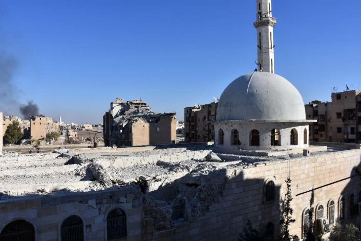A damaged mosque stands in the Masaken Hanano district in eastern Aleppo, a day after Syrian pro-government forces seized it from rebel fighters (AFP Photo/George Ourfalian)