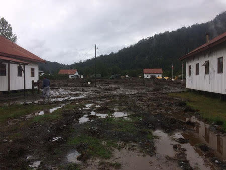 Damage done by a landslide is seen in Villa Santa Lucia, Los Lagos, Chile December 16, 2017 in this picture obtained from social media. CRISTIAN ZUMELZU BARROS/via REUTERS