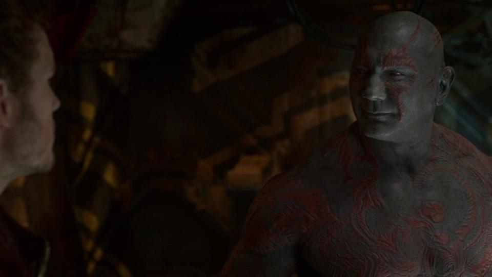 Dave Bautista as Drax smiles at Quill in Guardians of the Galaxy