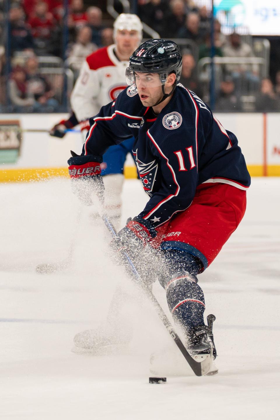 Nov 29, 2023; Columbus, Ohio, USA;
Columbus Blue Jackets center Adam Fantilli (11) looks for an open pass during the first period of their game against the Montreal Canadiens on Wednesday, Nov. 29, 2023 at Nationwide Arena.