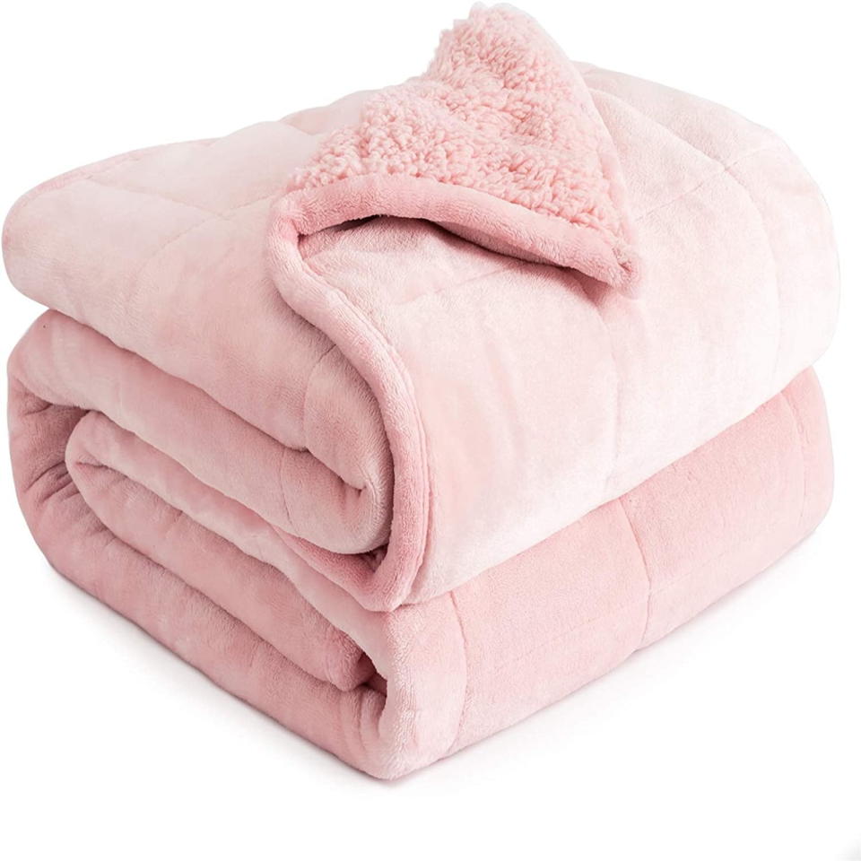 <p><a href="https://go.redirectingat.com?id=74968X1596630&url=https%3A%2F%2Fwww.walmart.com%2Fip%2FSivio-Fleece-Weighted-Blanket-15-lbs-60x80-inches-Flannel-and-Shaggy-Sherpa-Warm-Heavy-Blanket-for-Calming-and-Relax-Pink%2F1685958094&sref=https%3A%2F%2Fwww.bestproducts.com%2Flifestyle%2Fg45876965%2Fbest-cozy-gifts%2F" rel="nofollow noopener" target="_blank" data-ylk="slk:Shop Now;elm:context_link;itc:0;sec:content-canvas" class="link ">Shop Now</a></p><p>Fleece Weighted Blanket</p><p>walmart.com</p><p>$57.89</p>