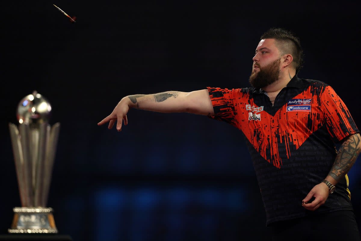 Michael Smith won the 2023 World Darts Championship (AFP via Getty Images)