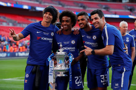 Soccer Football - FA Cup Final - Chelsea vs Manchester United - Wembley Stadium, London, Britain - May 19, 2018 Chelsea's David Luiz, Willian and Emerson Palmieri celebrate winning the final with the trophy Action Images via Reuters/Andrew Couldridge