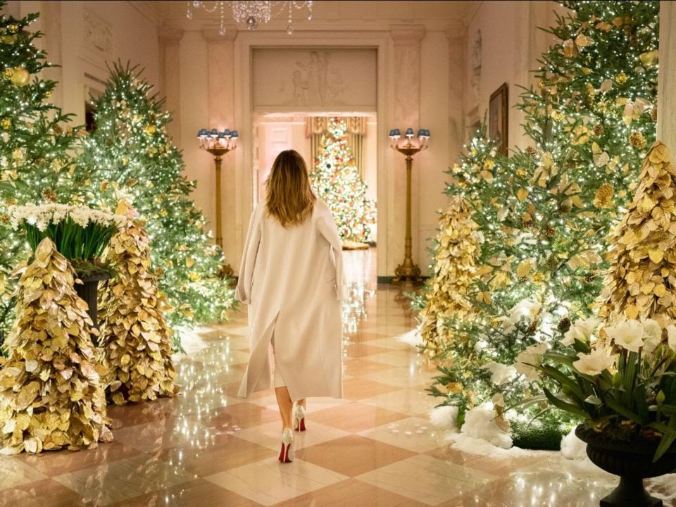 Melania Trump walks through the White House.
