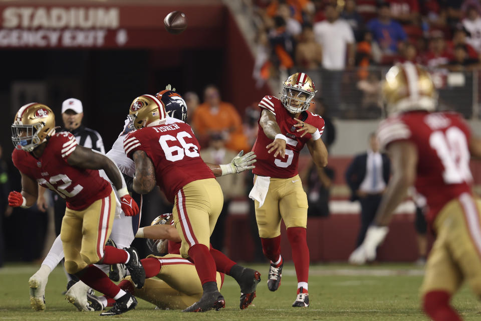 San Francisco 49ers quarterback Trey Lance (5) passes the ball against the Denver Broncos during the second half of an NFL preseason football game in Santa Clara, Calif., Saturday, Aug. 19, 2023. (AP Photo/Jed Jacobsohn)