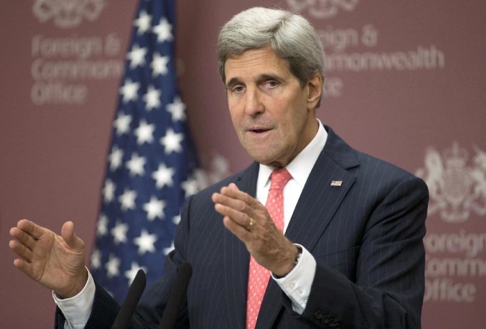 FILE - In this Oct. 22, 2013, file photo, U.S. Secretary of State John Kerry speaking to the media at the British Foreign Office in London. Kerry took part in London 11 friends of Syria meeting, and was responding to questions from the media. Kerry has spent nearly half of his first year as secretary of state jumping on and off airplanes and diving headlong into some of the world’s most difficult problems. Kerry has spent nearly half of his first year as secretary of state jumping on and off airplanes and diving headlong into some of the world’s most difficult problems. (AP Photo/Alastair Grant, Pool)