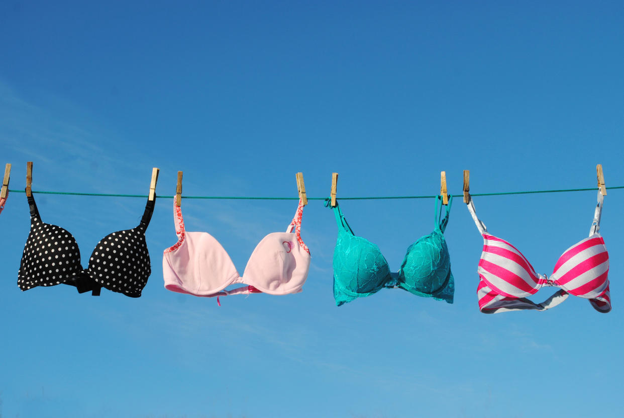 Four colorful Bras on Clothesline