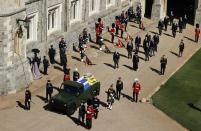 <p>The funeral procession arrives at St George’s Chapel.</p>