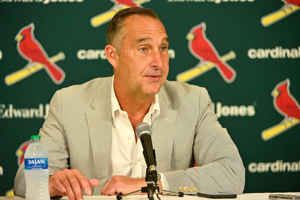 St. Louis Cardinals president of baseball operations John Mozeliak addresses reporters after the team traded three pitchers on Sunday.