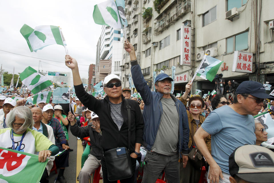 Pro-independence demonstrators stage a rally in Taipei, Taiwan, Saturday, Oct. 20, 2018. Thousands of the demonstrators gathered in Taiwan’s capital on Saturday to express their disapproval with China’s stance toward their island. (AP Photo/Chiang Ying-ying)