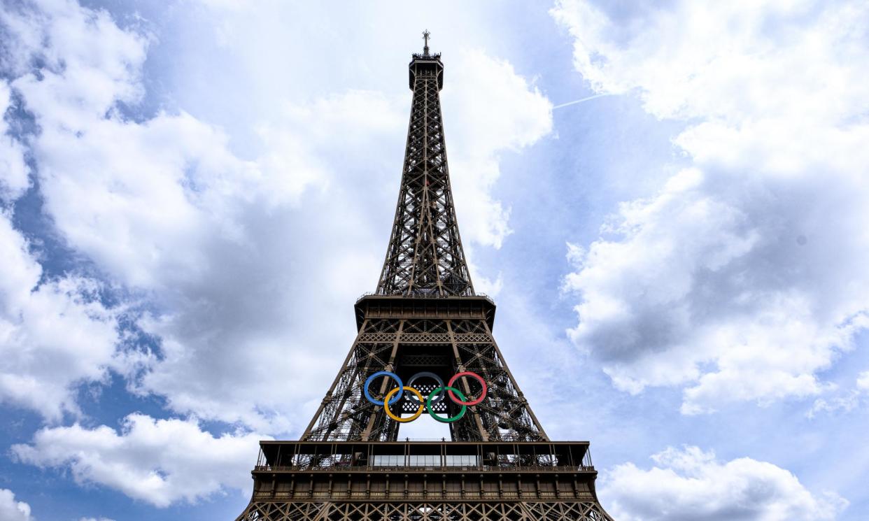 <span>Not that kind of irony … the Eiffel Tower welcomes the Olympics to Paris.</span><span>Photograph: Hubert Psaila Marie/Abaca/Rex/Shutterstock</span>