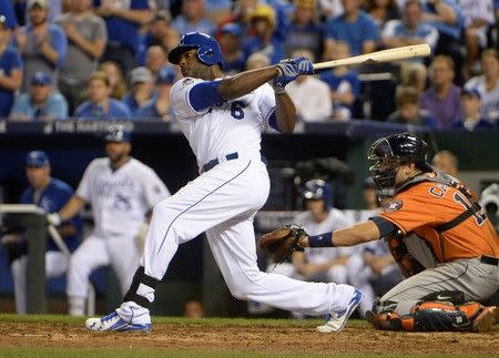 Oct 8, 2015; Kansas City, MO, USA; Kansas City Royals center fielder Lorenzo Cain hits a single against the Houston Astros in the 8th inning in game one of the ALDS at Kauffman Stadium.  John Rieger-USA TODAY Sports