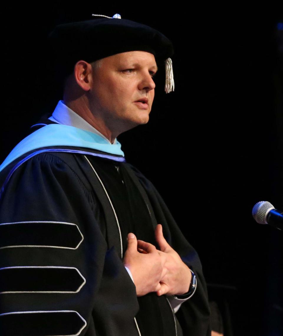 Dr. Michael Fischer, president of York County Community College, speaks to the graduating class at the school's 27th annual commencement May 13, 2022.