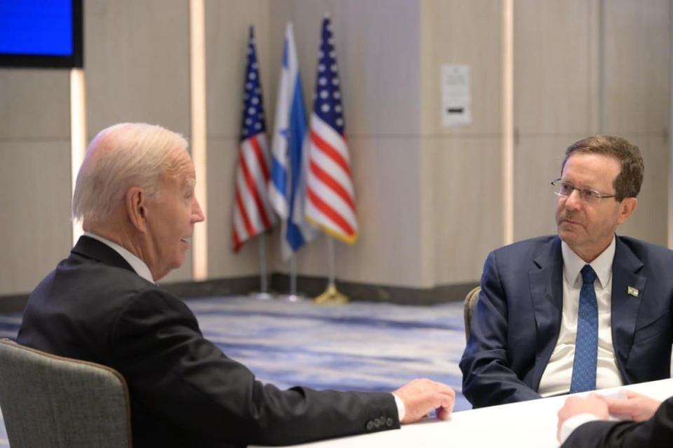 A photo including US President Joe Biden and Israeli President Isaac Herzog meeting in  Tel Aviv