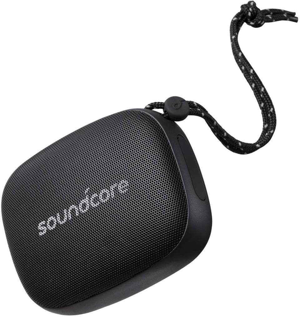 This mini waterproof speaker is a must for your next adventures. Image via Amazon.