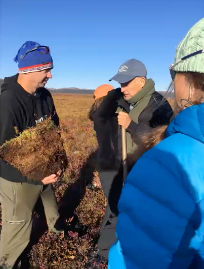 Bob Bolton shows a carbon plug, the permafrost subsoil in Alaska that could release carbon dioxide and methane to the air as the frozen soil at the surface thaws.