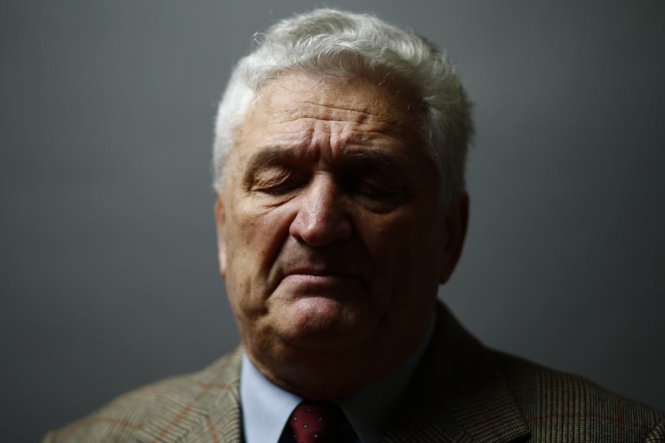 Auschwitz death Camp survivor Jacek Nadolny poses for a portrait in Warsaw