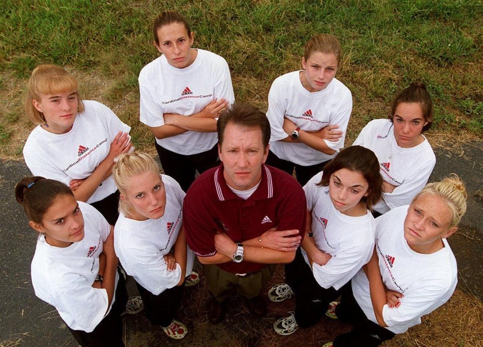 The Colerain girls cross-country team won four straight state titles from 1997 to 2000. The 1999 team included, from left, front, Alison Zeinner, Kelly Crum, coach Ron Russo, Alison Bedingfield, Catie Grebe; back, Jennifer Limle, Terie Littlepage, Shelly Dickinson and Lori Siconolfi.