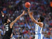 <p>North Carolina Tar Heels guard Joel Berry II (2) shoots over Gonzaga Bulldogs guard Josh Perkins (13) in the second half in the championship game of the 2017 NCAA Men’s Final Four at University of Phoenix Stadium. Mandatory Credit: Bob Donnan-USA TODAY Sports </p>