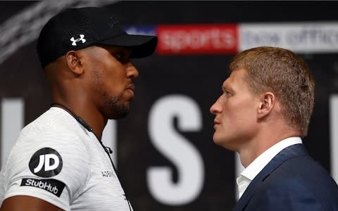 Anthony Joshua (left) and Alexander Povetkin (right)  - Credit: Getty Images 