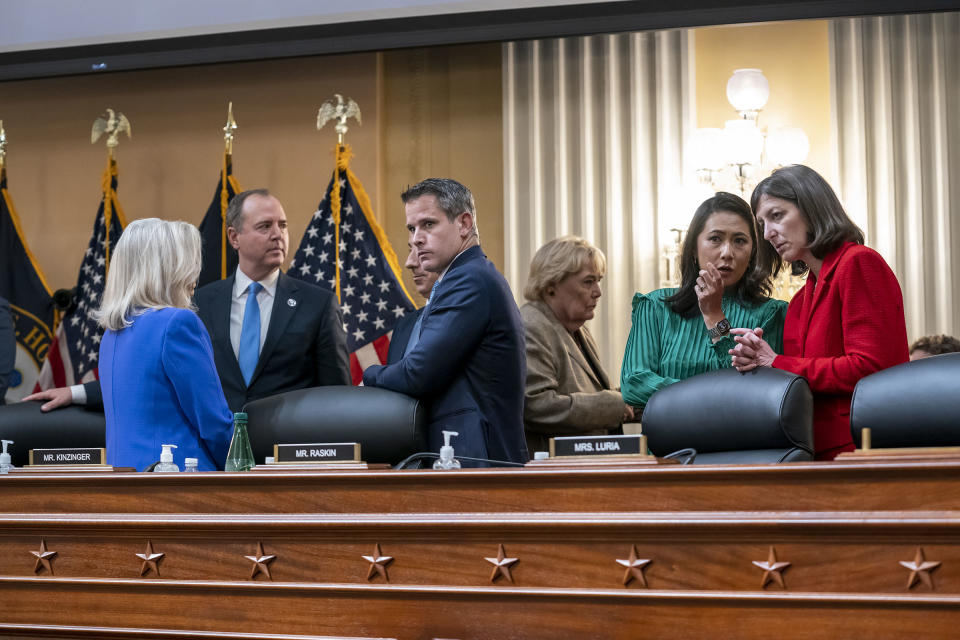 From left Vice Chair Liz Cheney, R-Wyo., Rep. Adam Schiff, D-Calif., Rep. Jamie Raskin, D-Md., partially obscured, Rep. Adam Kinzinger, R-Ill., Rep. Zoe Lofgren, D-Calif., Rep. Stephanie Murphy, D-Fla., and Rep. Elaine Luria, D-Va., during a break at a public hearing to reveal the findings of a year-long investigation on the Jan. 6 attack on the U.S. Capitol, June 9, 2022.<span class="copyright">J. Scott Applewhite—AP</span>