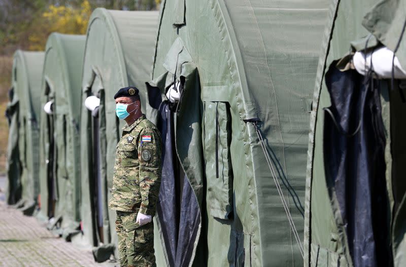 FILE PHOTO: A soldier wearing a face mask is seen outside one of the tents which are built for patients who will have coronavirus disease (COVID-19) at Dubrava hospital in Zagreb