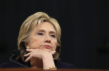 Hillary Clinton listens to a question as she testifies before the House Select Committee on Benghazi, on Capitol Hill in Washington October 22, 2015. REUTERS/Jonathan Ernst