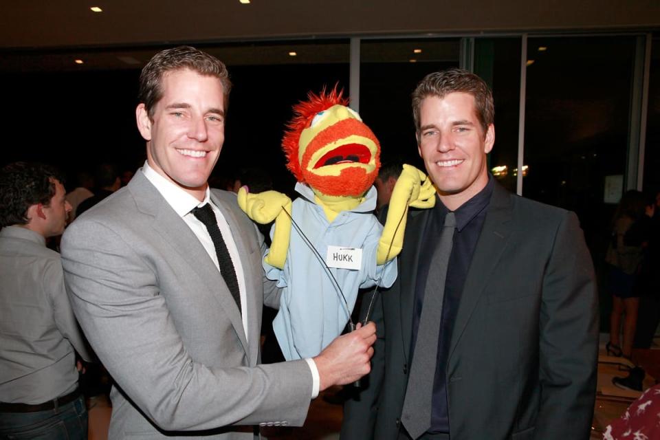 <div class="inline-image__caption"><p>Cameron Winklevoss and Tyler Winklevoss pose at a Los Angeles holiday party in 2012.</p></div> <div class="inline-image__credit">Todd Oren/Getty</div>