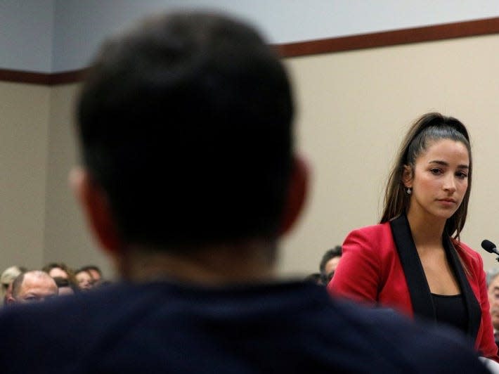 Victim and former gymnast Aly Raisman speaks at the sentencing hearing for Larry Nassar, (R) a former team USA Gymnastics doctor who pleaded guilty in November 2017 to sexual assault charges, in Lansing, Michigan, U.S., January 19, 2018. REUTERS/Brendan McDermid     TPX IMAGES OF THE DAY