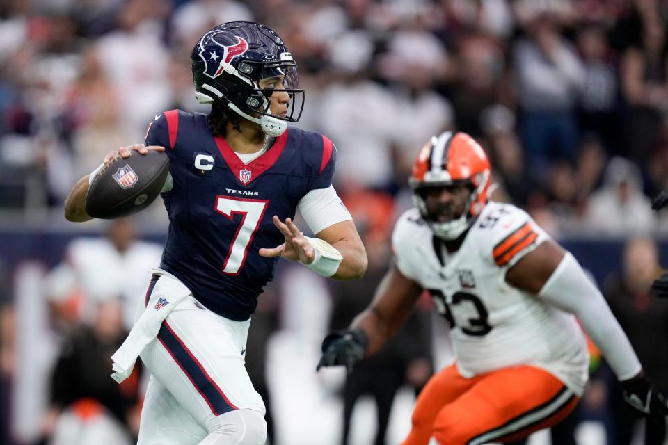 Houston Texans quarterback C.J. Stroud passes against the Cleveland Browns during the first half of a wild-card playoff game Saturday in Houston.