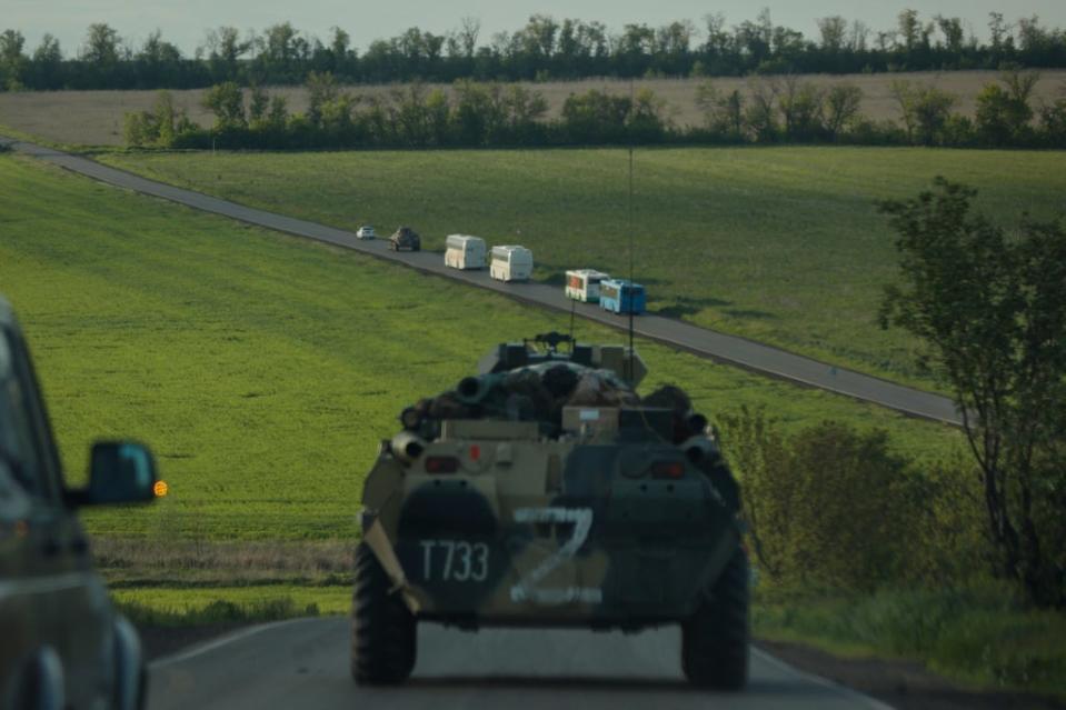 Buses with Ukrainian servicemen evacuated from the Mariupol’s Azovstal steel plant (AP)