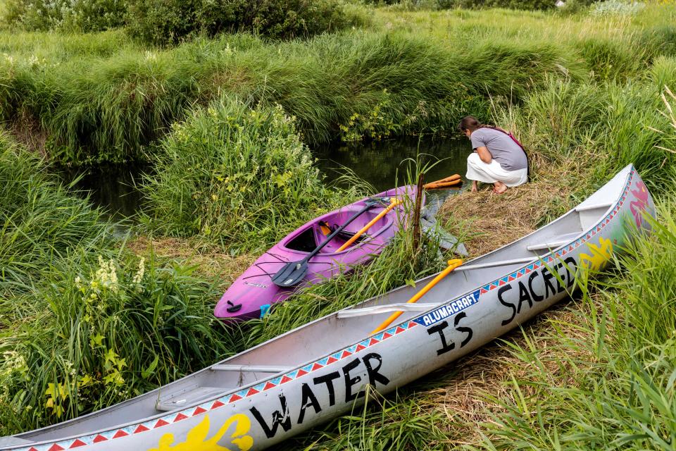 A trailer used by water protectors is seen at the Firelight Resistance camp near La Salle Lake State Park in Solway, Minn., on Aug. 7, amid rallies against Line 3, a proposed pipeline expansion to bring tar sands from Canada to Wisconsin.