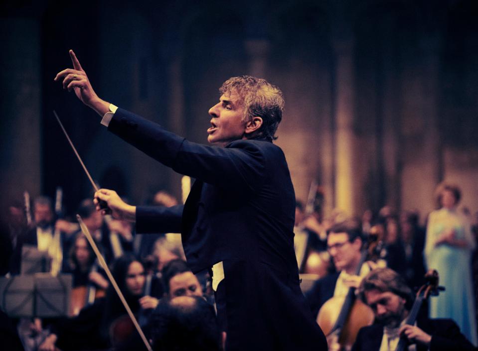 Leonard Bernstein (Bradley Cooper) conducts Mahler's "Resurrection" Symphony at England's Ely Cathedral, one of the key scenes of "Maestro."