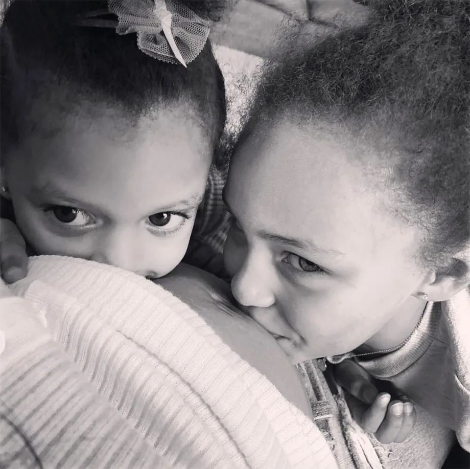 <p>Bring on the baby! Ayesha shared a heartwarming photo of <a href="https://people.com/parents/stephen-and-ayesha-curry-daughter-ryan-all-grown-up-7th-birthday/" rel="nofollow noopener" target="_blank" data-ylk="slk:Riley and Ryan;elm:context_link;itc:0" class="link ">Riley and Ryan</a> kissing her baby bump in March 2018. The then-mom-of-two announced she was <a href="https://people.com/parents/stephen-curry-ayesha-pregnant-expecting-third-child/" rel="nofollow noopener" target="_blank" data-ylk="slk:expecting a third;elm:context_link;itc:0" class="link ">expecting a third</a> in February that year.</p> <p>"Heyyyy how did this happen?!🤷🏽‍♀️. Curry party of 5," Ayesha captioned a photo of herself looking down at her baby belly, wearing a <a href="http://go.redirectingat.com/?id=58287X1516331&xs=1&isjs=1&url=http%253A%252F%252Fus.asos.com%252Fasos-maternity%252Fasos-maternity-preggers-slogan-tee%252Fprd%252F7548563%253F%2526affid%253D14174%2526channelref%253Dproduct%252Bsearch%2526mk%253Dabc%2526currencyid%253D2%2526ppcadref%253D753857714%25257C38363295566%25257Cpla-279162849539%2526gclid%253DCj0KEQjwoqvIBRD6ls6og8qB77YBEiQAcqqHe6kIiiweSeyjf4SXDInbglmSfFVFl5l41XAqUt9a45oaAkXk8P8HAQ%2526utm_source%253DAffiliate%2526utm_medium%253DLinkShare%2526utm_content%253DUSNetwork.1%2526utm_campaign%253D93xLBvPhAeE%2526link%253D10%2526promo%253D460292%2526source%253Dlinkshare%2526MID%253D35719%2526affid%253D2135%2526channelref%253DAffiliate%2526pubref%253D93xLBvPhAeE%2526siteID%253D93xLBvPhAeE-fKaxr3T9YgGwLAzzMlcTnw&xguid=512baad4986d5aa3d463704bab6c2bd3&xuuid=78ee47781441e8fe02f221b46d7518f9&xsessid=e43d9b3a5f4498fedfb8fa1186949e67&xcreo=0&xed=0&sref=http%253A%252F%252Fpeople.com%252Fbabies%252Fbeyonce-pregnant-preggers-t-shirt-photo%252F&pref=https%253A%252F%252Fwww.google.com%252F&xtz=300" rel="nofollow noopener" target="_blank" data-ylk="slk:T-shirt that reads "PREGGERS";elm:context_link;itc:0" class="link ">T-shirt that reads "PREGGERS"</a> — the same shirt <a href="https://people.com/tag/beyonce/" rel="nofollow noopener" target="_blank" data-ylk="slk:Beyoncé;elm:context_link;itc:0" class="link ">Beyoncé</a> famously rocked <a href="https://people.com/babies/beyonce-pregnant-preggers-t-shirt-photo/" rel="nofollow noopener" target="_blank" data-ylk="slk:while pregnant with twins;elm:context_link;itc:0" class="link ">while pregnant with twins</a>.</p> <p>"Feeling very blessed… and very sick. Yippie! <a href="https://www.instagram.com/explore/tags/curryfor3/" rel="nofollow noopener" target="_blank" data-ylk="slk:#curryfor3;elm:context_link;itc:0" class="link ">#curryfor3</a>😍🤰🏽," she added.</p>