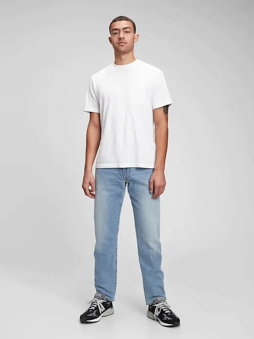 model wears light blue Everyday Straight Jeans in GapFlex with Washwell. Image via Gap.