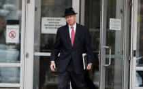 Defense attorney Tom Plunkett leaves the Hennepin County Public Safety Facility after his client, former Minneapolis police officer Mohamed Noor, made his first court appearance after being charged in the fatal shooting of Justine Ruszczyk Damond in Minneapolis, Minnesota, U.S. March 21, 2018. REUTERS/Eric Miller