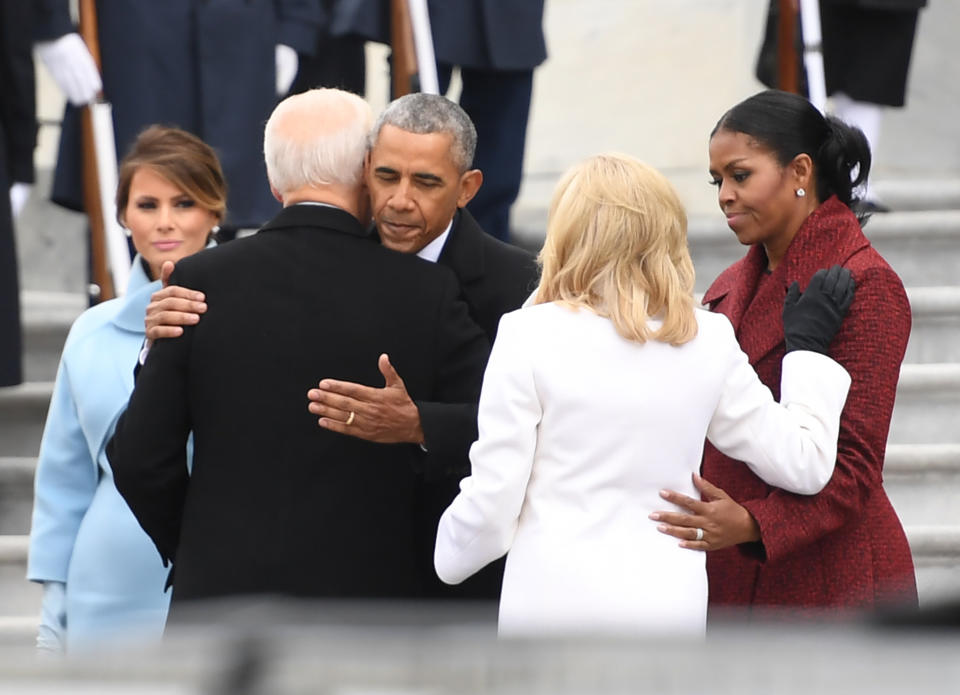 Joe Biden embraces Barack Obama at the 2017 presidential inauguration of Donald Trump. (Photo: JIM WATSON via Getty Images)