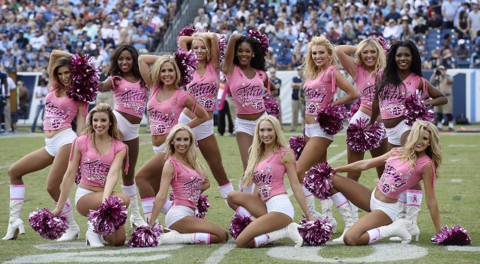 <p>Tennessee Titans cheerleaders perform in pink uniforms for breast cancer awareness in the first half of an NFL football game between the Titans and the Cleveland Browns Sunday, Oct. 16, 2016, in Nashville, Tenn. (AP Photo/Mark Zaleski) </p>