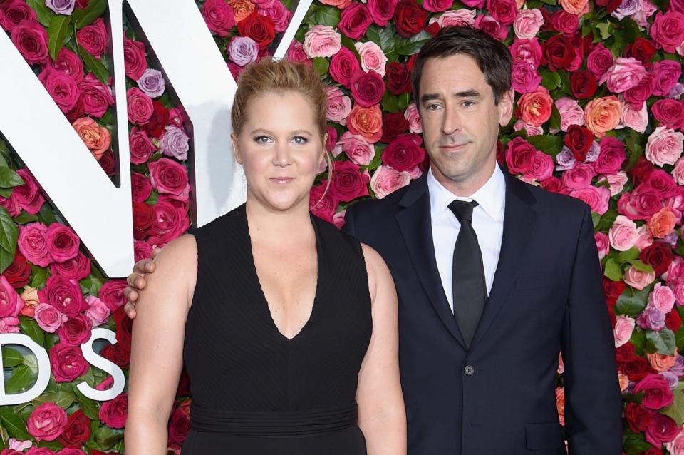 Amy Schumer and Chris Fischer.