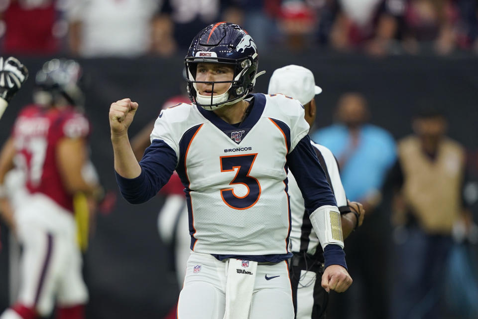 Denver Broncos quarterback Drew Lock (3) celebrates a score against the Houston Texans during the first half of an NFL football game Sunday, Dec. 8, 2019, in Houston. (AP Photo/David J. Phillip)