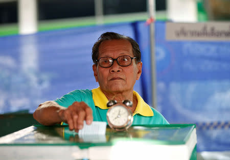 A voter casts his ballot in the general election at a polling station in Bangkok, Thailand, March 24, 2019. REUTERS/Soe Zeya Tun