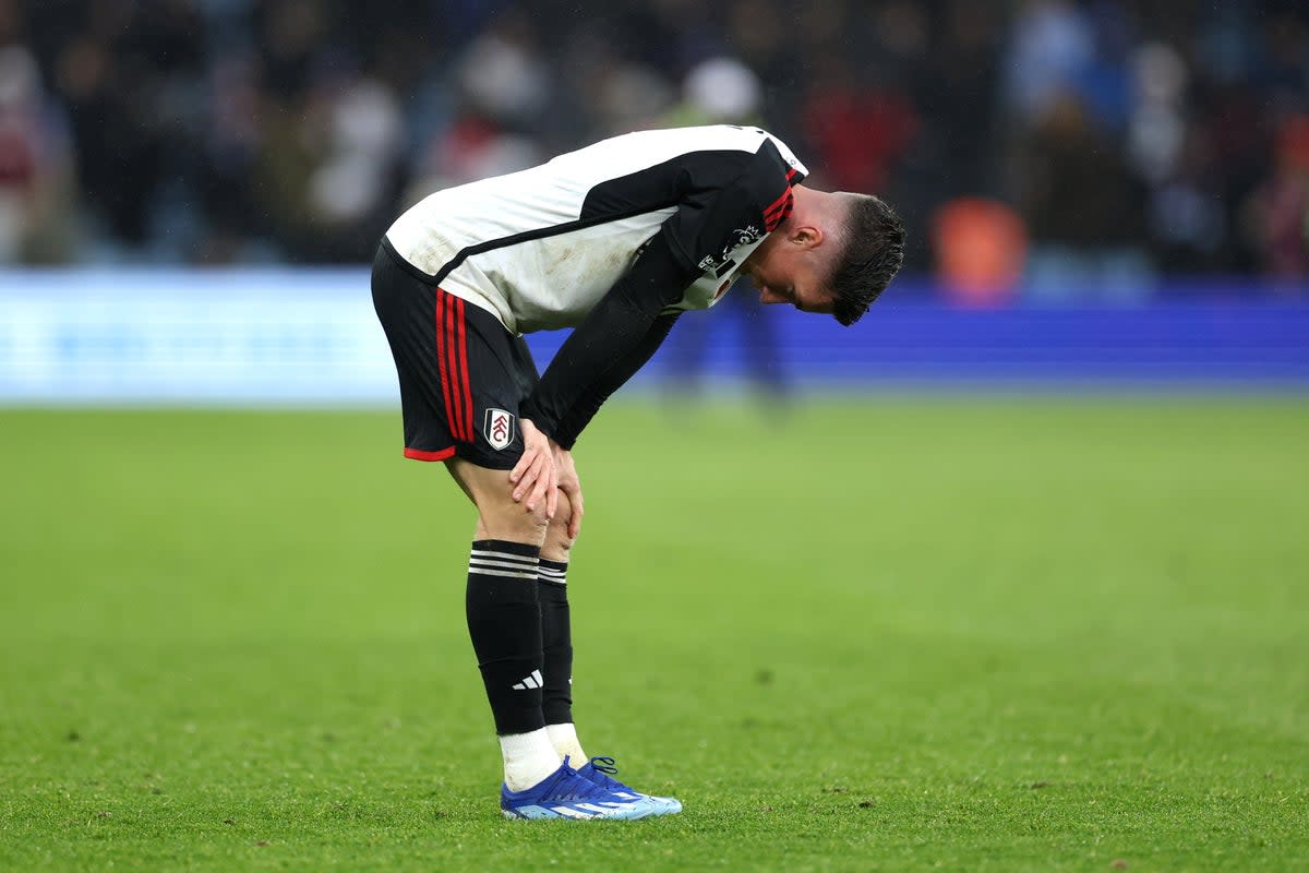 Dejected: Fulham went down 3-1 to Aston Villa in the Premier League (Getty Images)