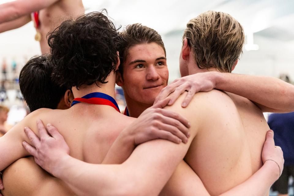 Swimmers from Syracuse High School celebrate after competing at the Utah 6A State Meet at the Stephen L. Richards Building in Provo on Saturday, Feb. 24, 2024. | Marielle Scott, Deseret News